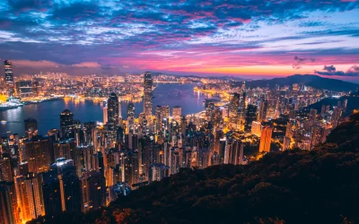 Vibrant Hong Kong City Skyline at Twilight with Dazzling Lights and Dramatic Sky image