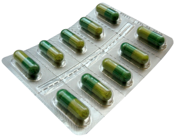 Pills in a blister on a white isolated background