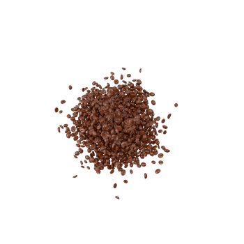 A pile of coffee beans that have been scattered on a white surface